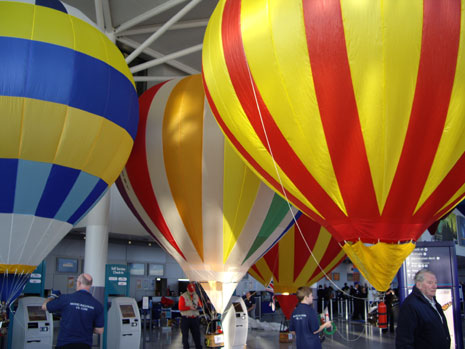 Balloons at Bristol International Airport greeted the passengers  checking in for the special scenic flight to Filton (Mel Kelly).